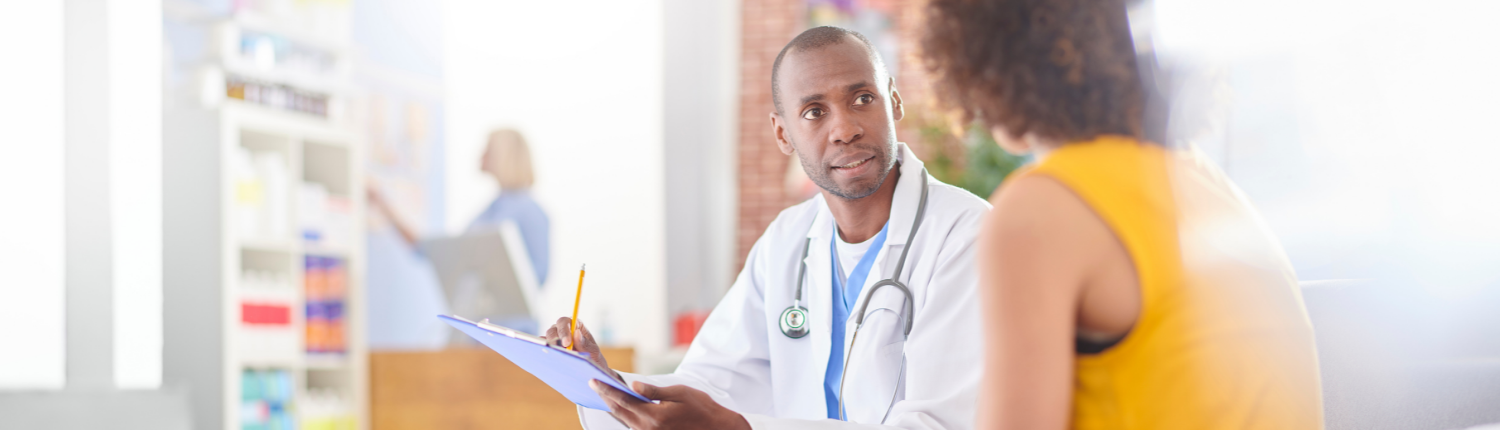 Doctor speaking to patient.