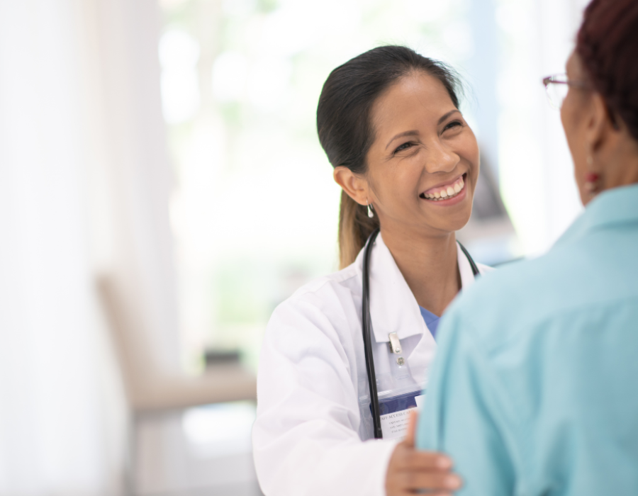 A woman talking with her physician.