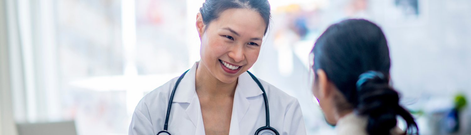 Doctor speaking with patient