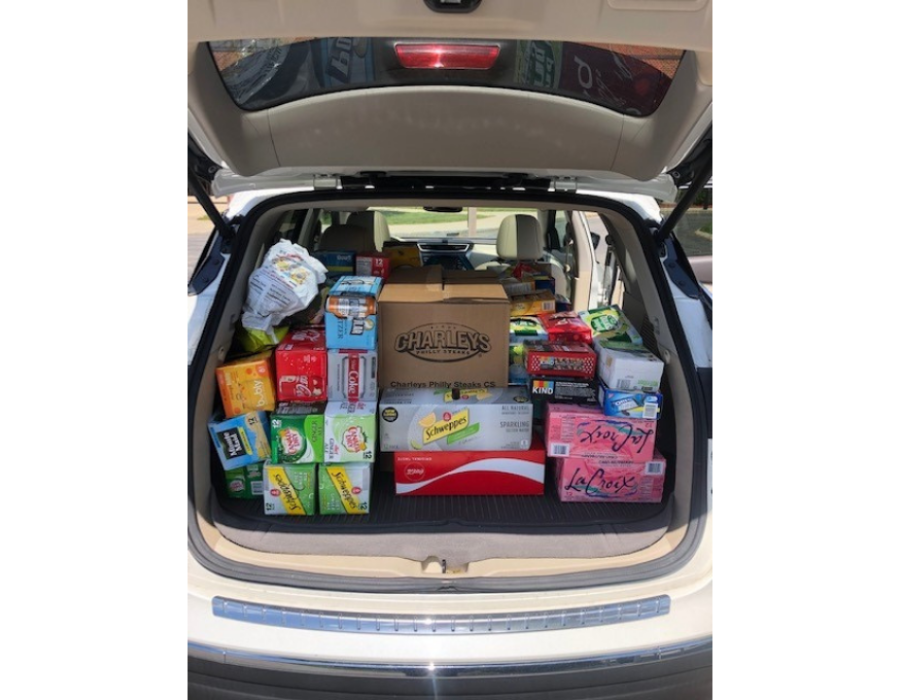 car full of food donations